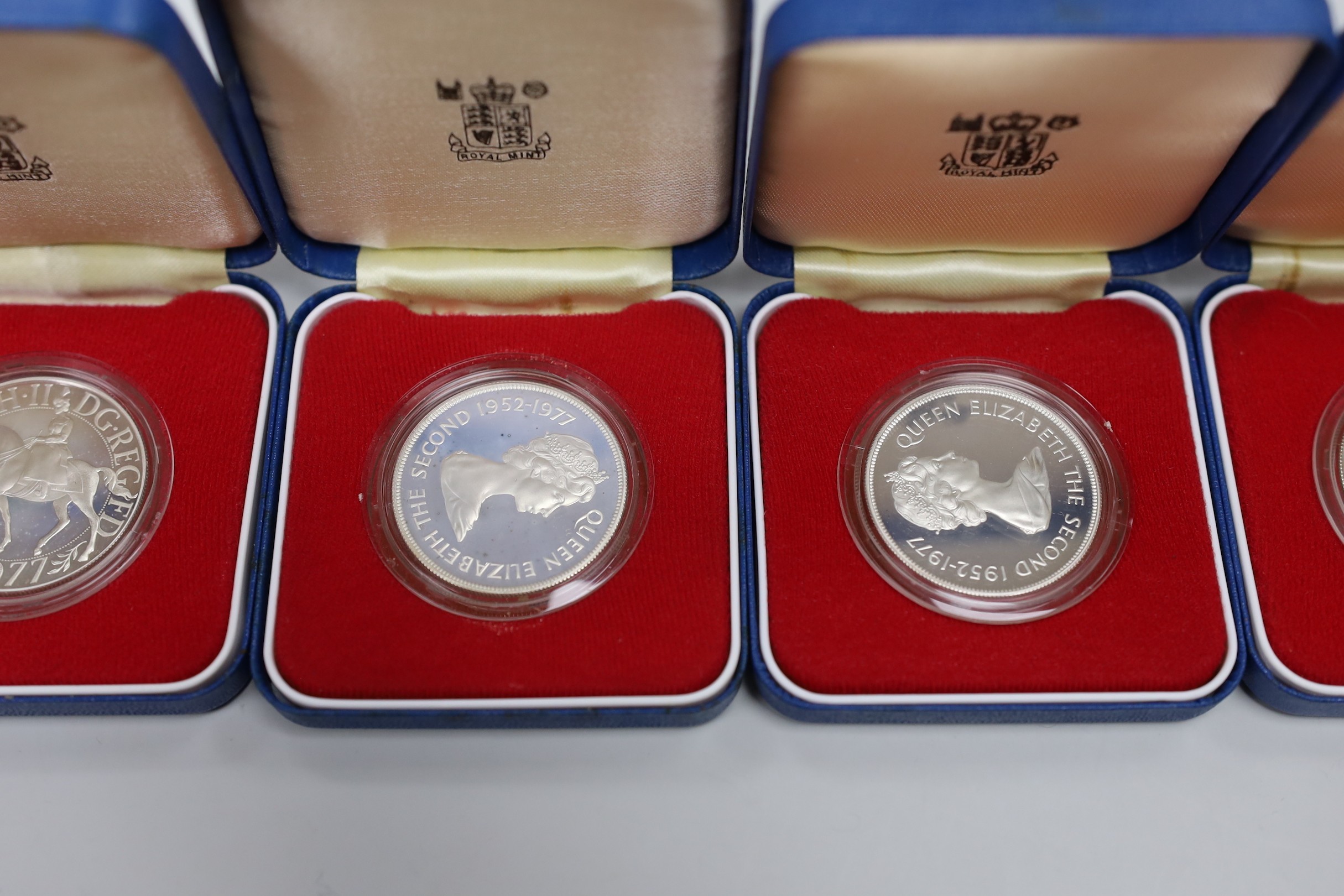 Royal Mint proof silver coins - three QEII UK Silver Jubilee crowns and four Commonwealth crowns (7)